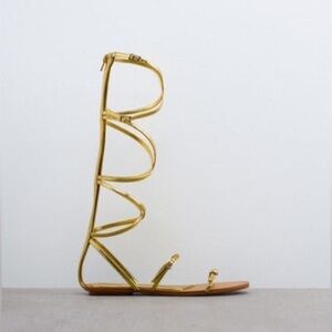 NWT. Zara Golden Strappy Flat Sandals with Buckle Details. Size 7,5.